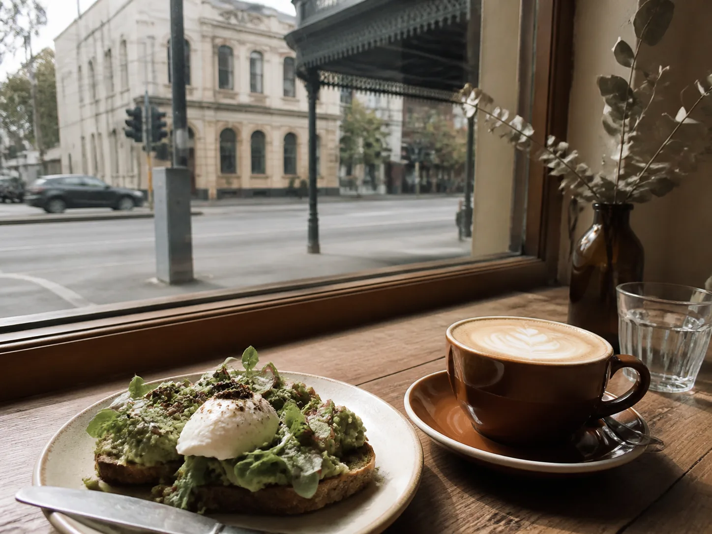 Flat white and brunch beside a South Melbourne café window